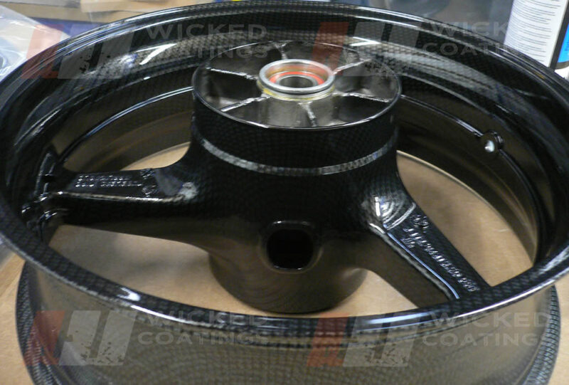 carbon dipping on a motorcycle wheel