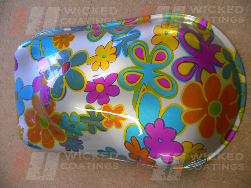 multi coloured flower over silver base
