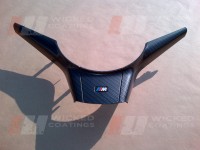 carbon dipped BMW interior part with satin lacquer finish