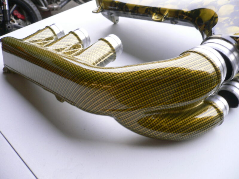 Vauxhall Vectra plenums in black carbon weave over yellow