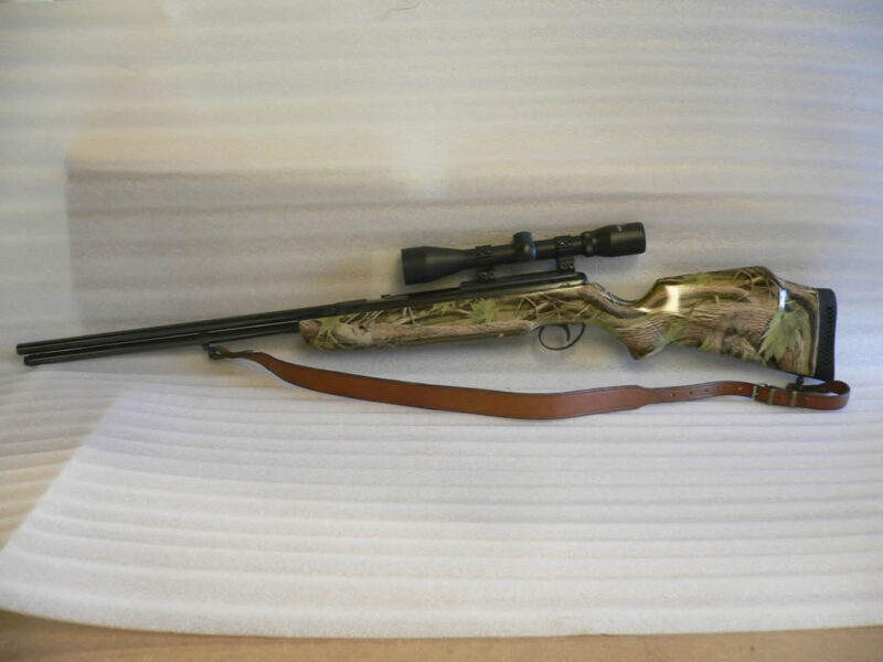 Real camo dipped rifle