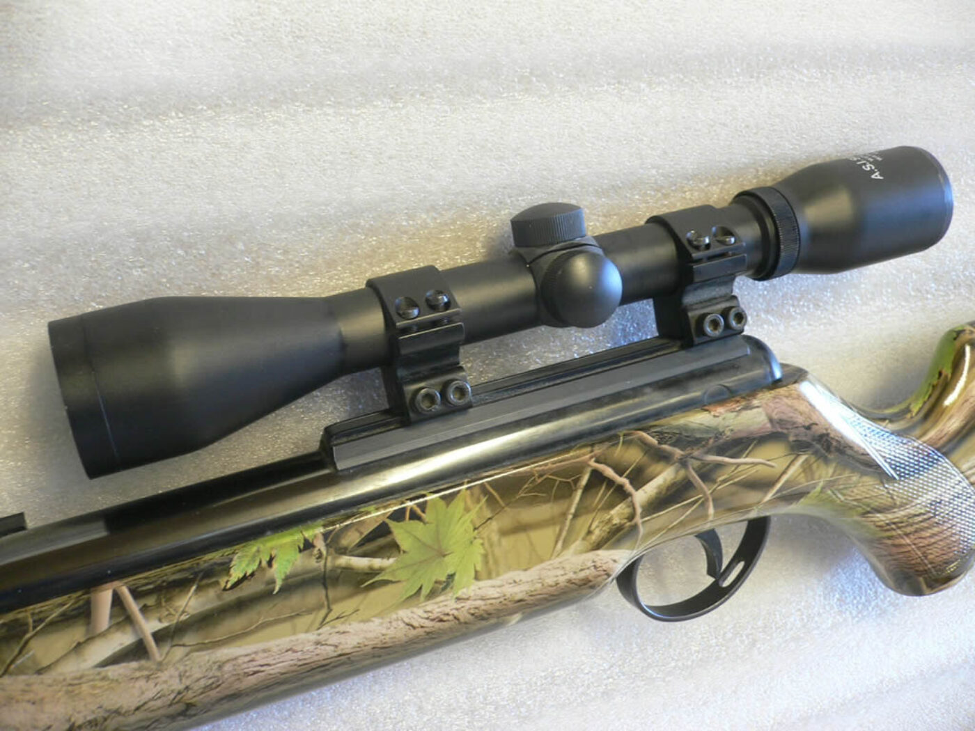 Real camo dipped rifle