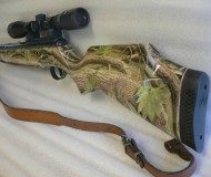 Real camo dipped rifle