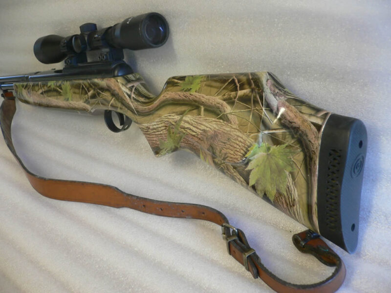 Real camo dipped rifle