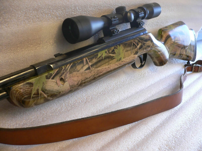 Real camo dipped rifle