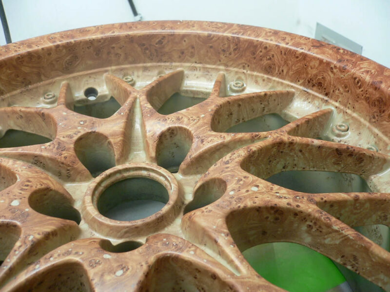 Walnut dipped alloy wheel before laquer