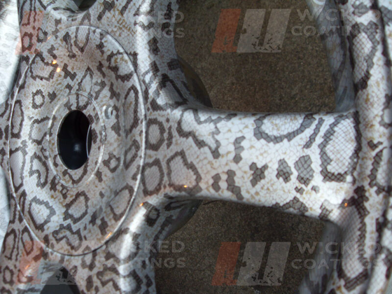 snake skin water transfer printing over a silver wheel