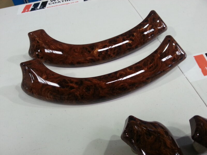 Car Interior Elements Coated In Wood Hydrographic Film