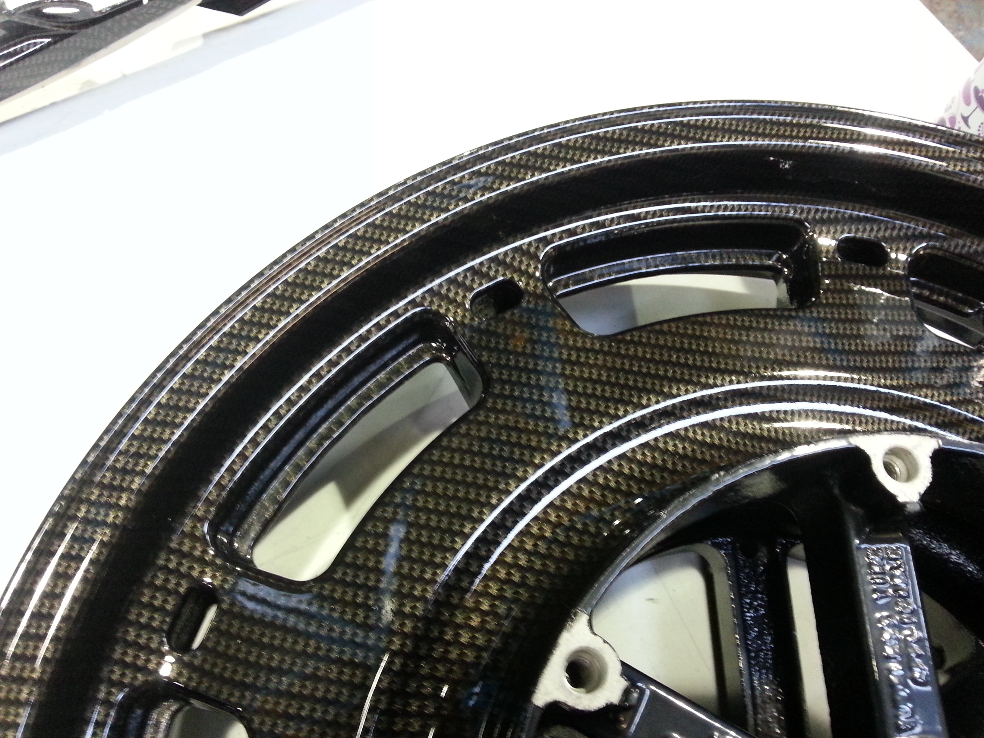 Motorbike Alloy Wheels Coated In Carbon Fibre Painted Black