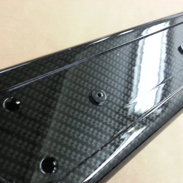 Car interior various parts coated in carbon fibre