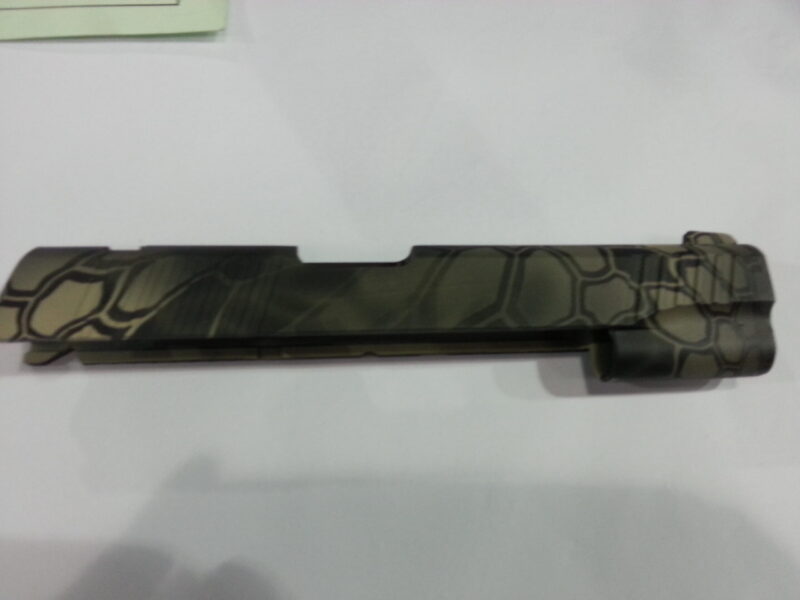 Gun Coated In Camouflage Hydrographic Film