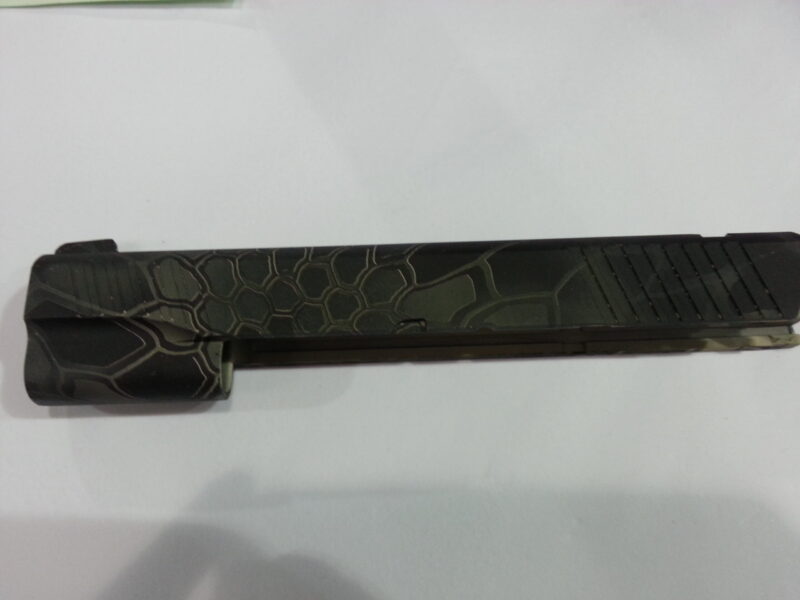 Gun Coated In Camouflage Hydrographic Film