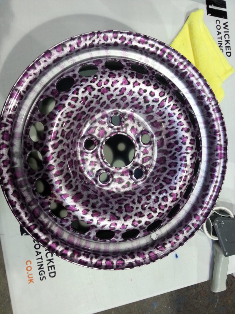 Car Alloy Wheels Coated In Panther Hydrographic Film Painted Pink