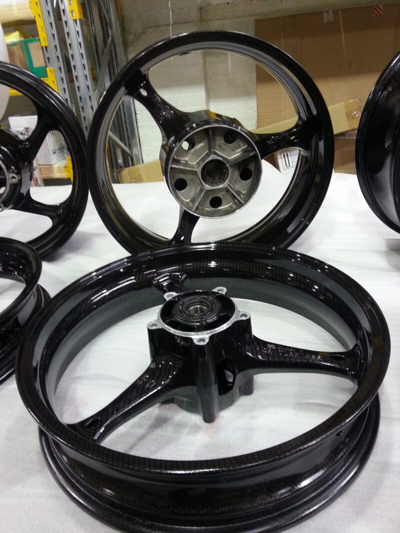 Motorbike wheels coated in carbon fibre