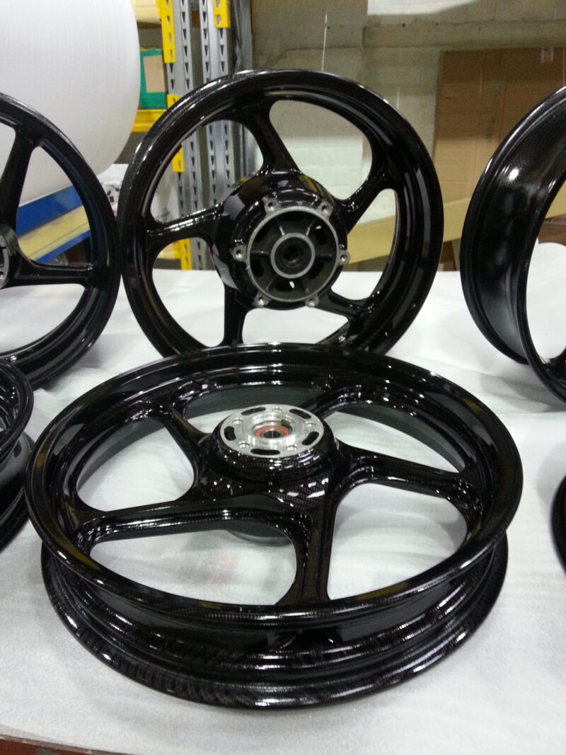 Motorbike wheels coated in carbon fibre