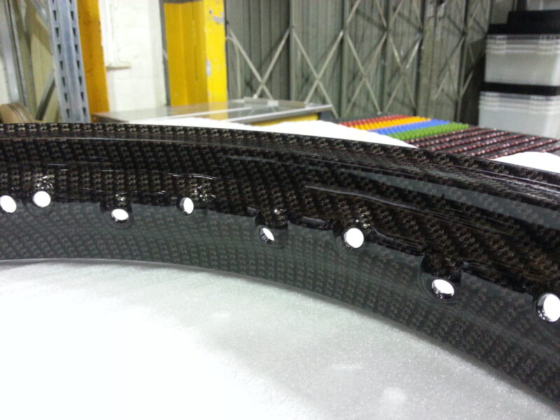 Motorbike wheels coated in carbon fibre