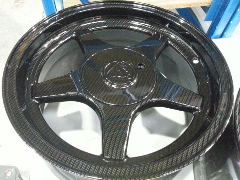 Lotus Alloy Wheels Coated In Carbon Fibre Hydrographic Film Painted Black