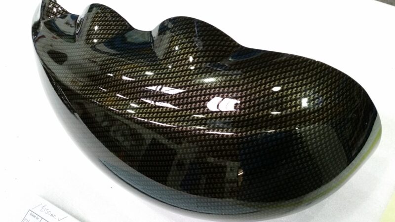 Car interior elements coated in carbon fibre