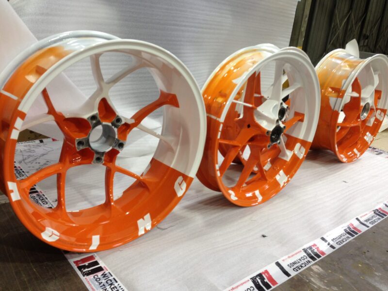 KTM Racing wheels painted white and orange