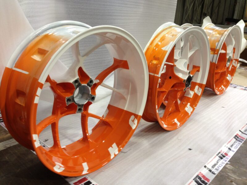 KTM Racing wheels painted white and orange