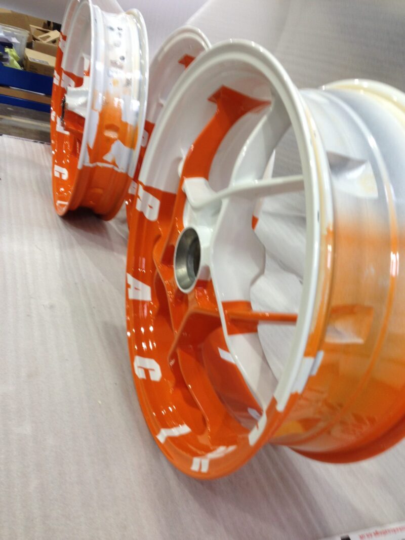 KTM Racing wheels painted white and orange