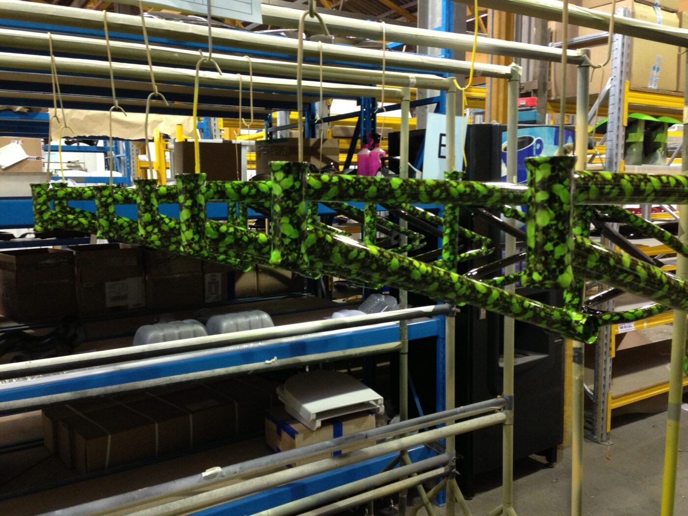 Bike frame coated in skull pattern painted green