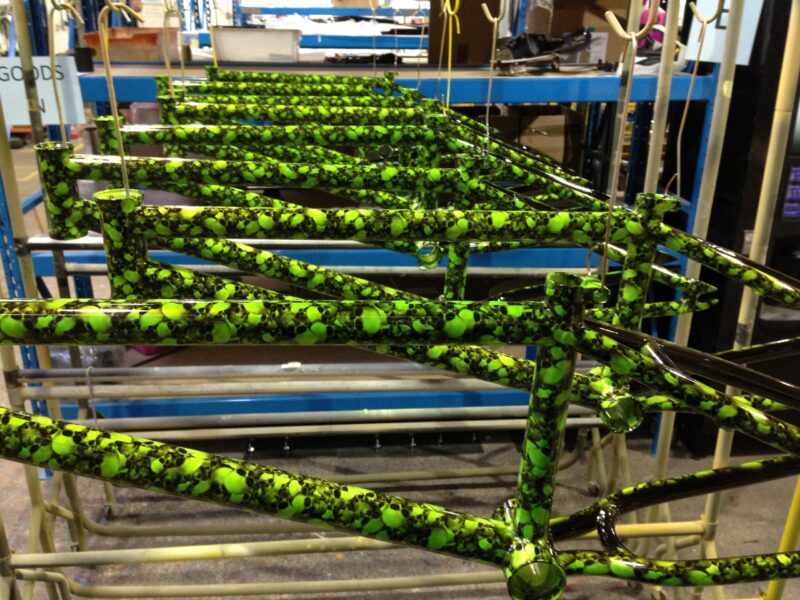 Bike frame coated in skull pattern painted green
