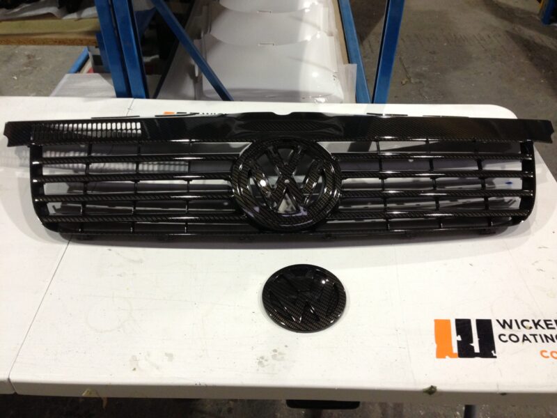Various Car Parts Coated In Carbon Fibre