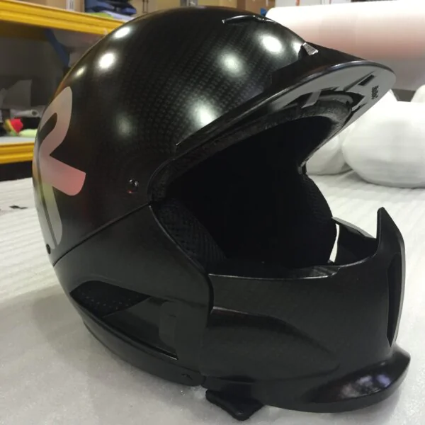 Motorbike Helmets Coated In Carbon Fibre Painted Black