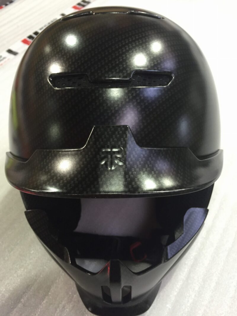 Motorbike Helmets Coated In Carbon Fibre Painted Black