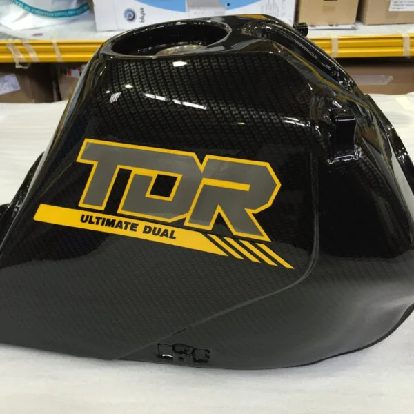 Motorbike tank coated in carbon fibre