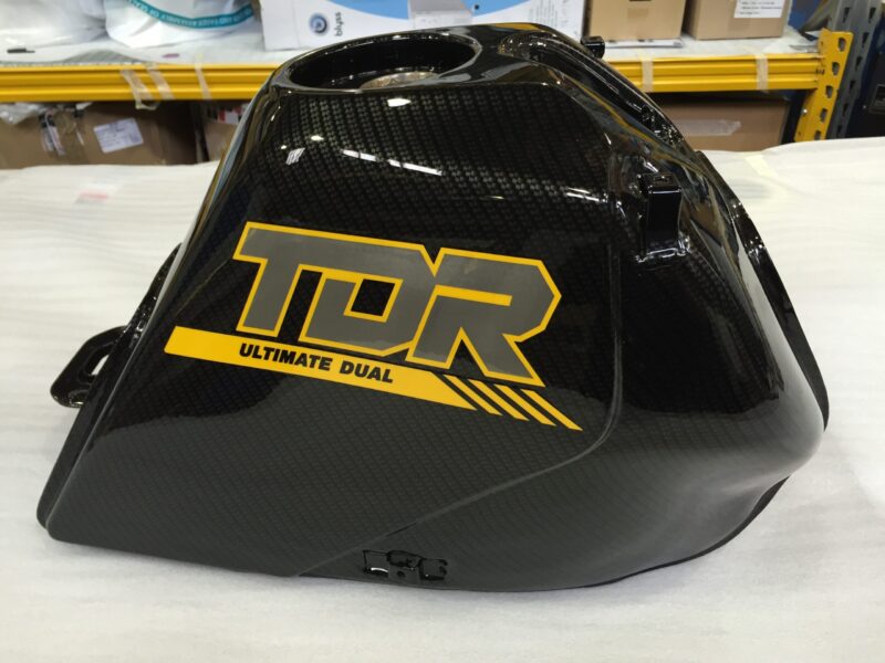 Motorbike tank coated in carbon fibre