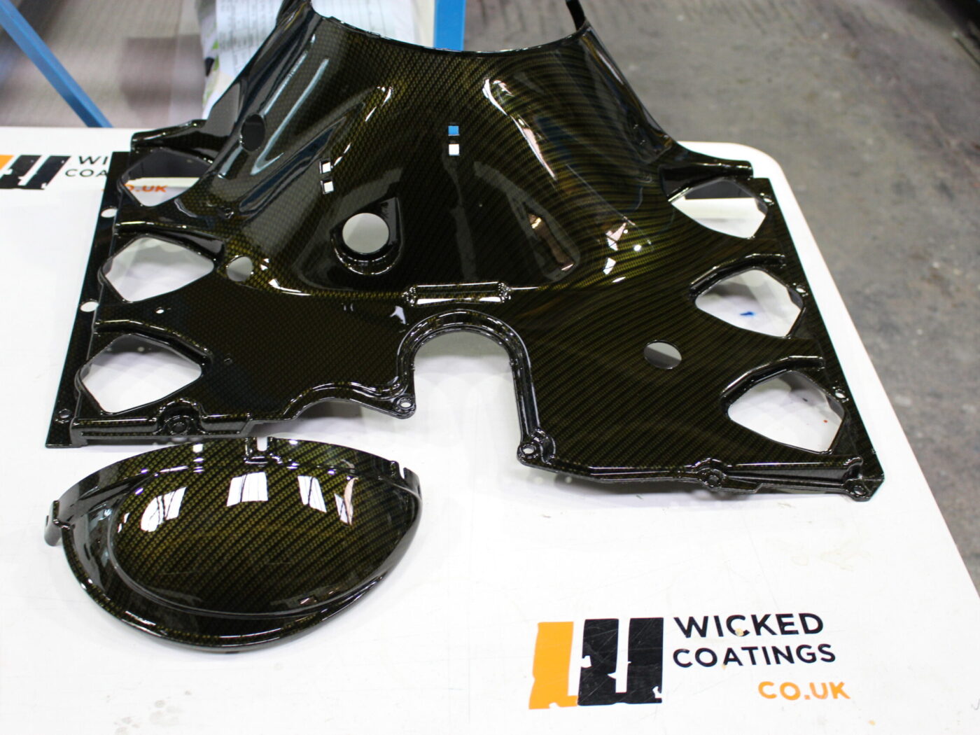 Motorbike parts coated in carbon fibre
