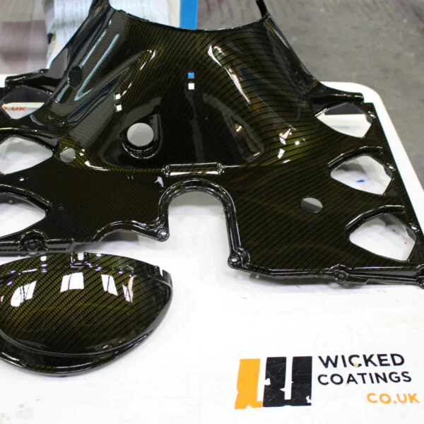 Motorbike parts coated in carbon fibre