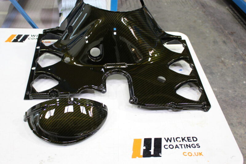 Motorbike parts coated in carbon fibre