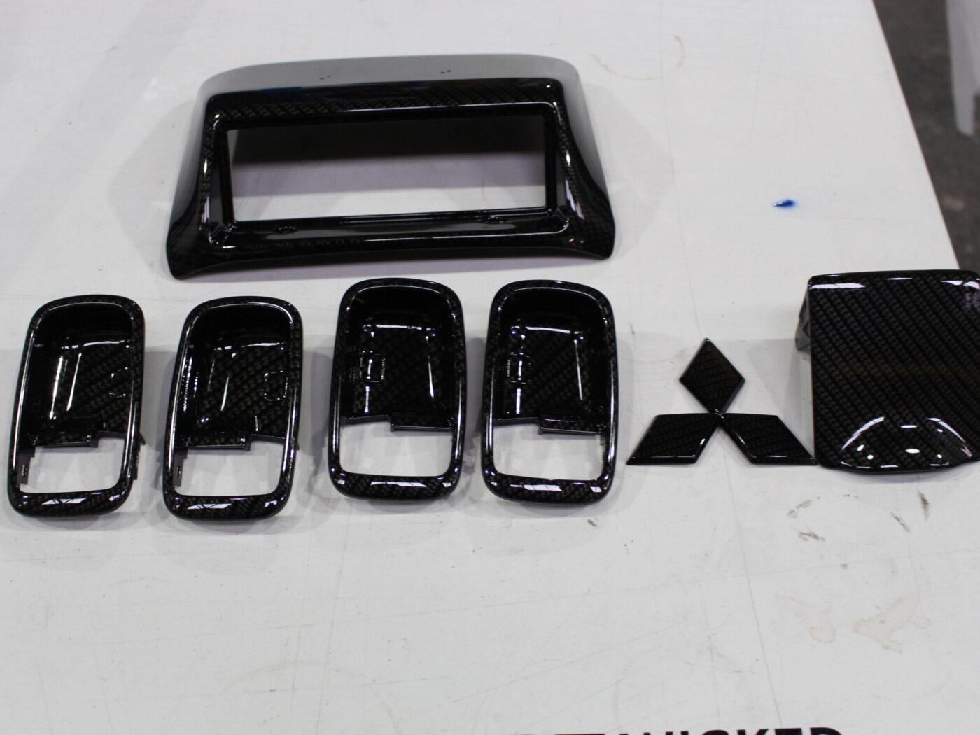 Mitsubishi interior coated in carbon fibre