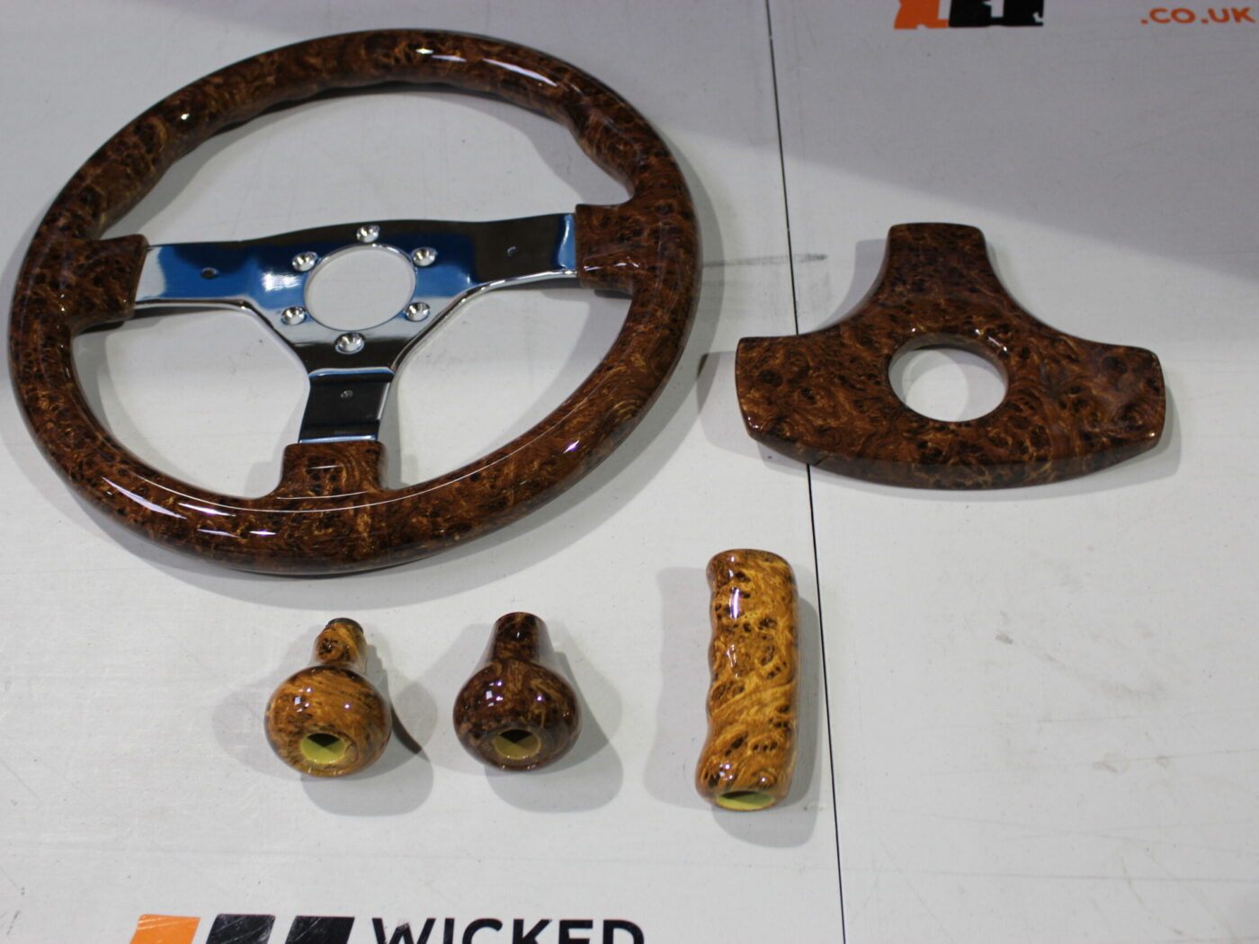 Car steering wheel coated in wood