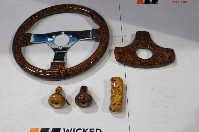 Car steering wheel coated in wood
