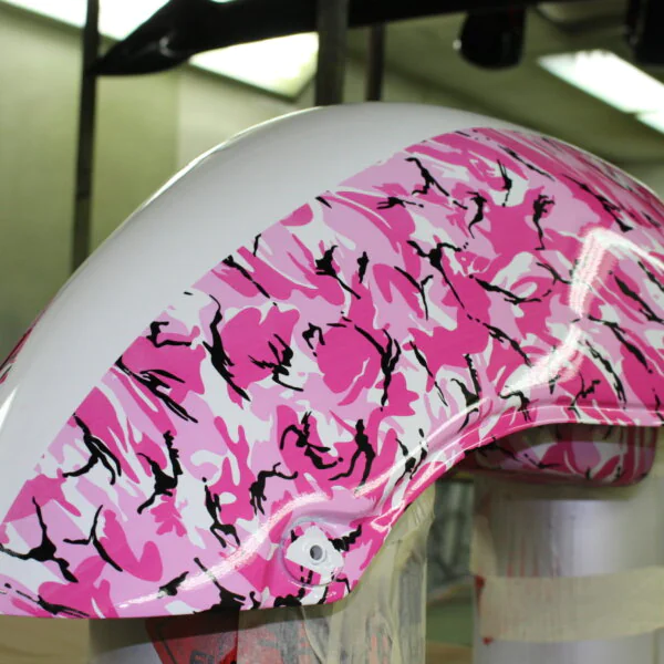 Motorbike tank painted in white, coated in fancy como hydrographic film.