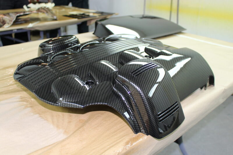 Engine parts coated in carbon fibre