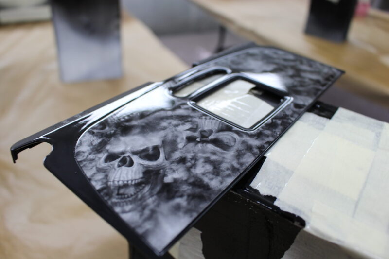 Parts of dashboard coated in skull