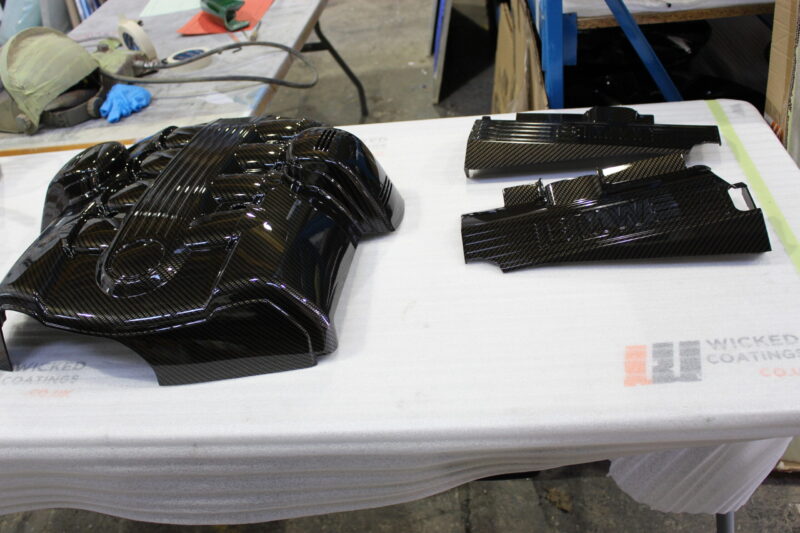 BMW engine elements coated in carbon fibre