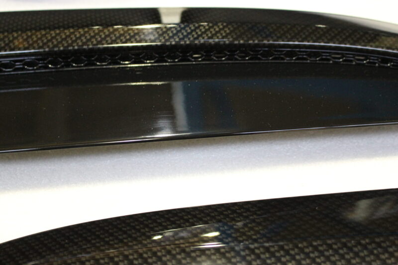 Car exterior elements coated in carbon fibre