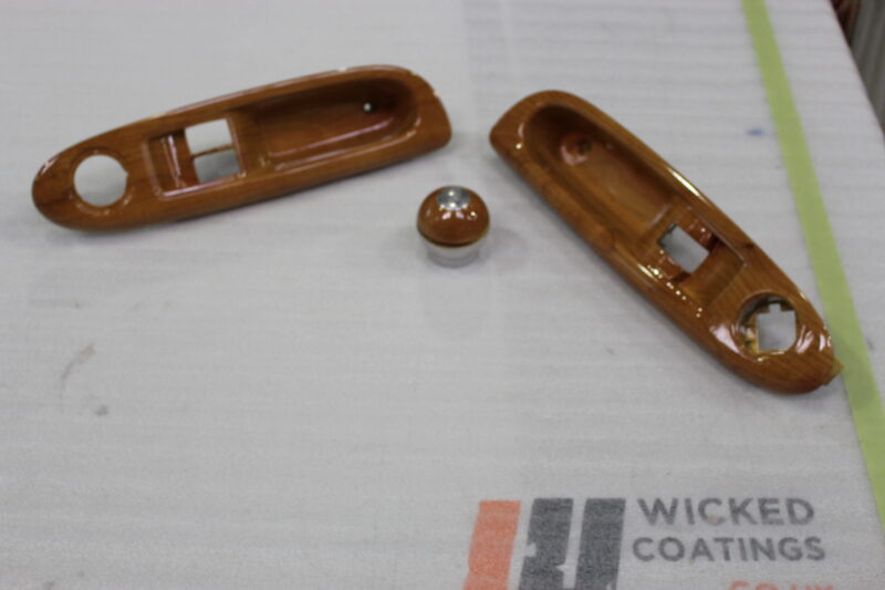 Car interior elements coated in wood