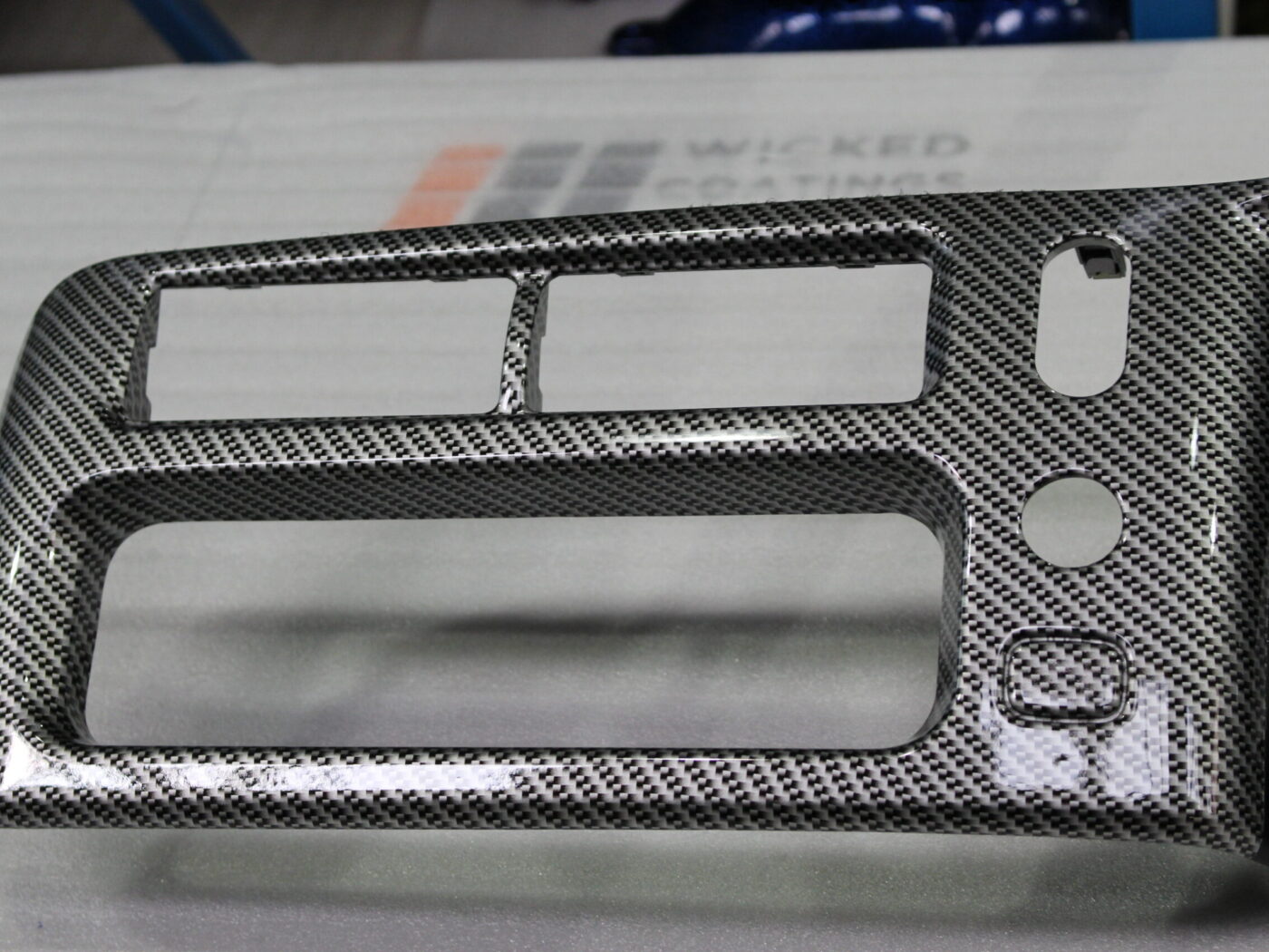Dashboard coated in carbon fibre painted silver