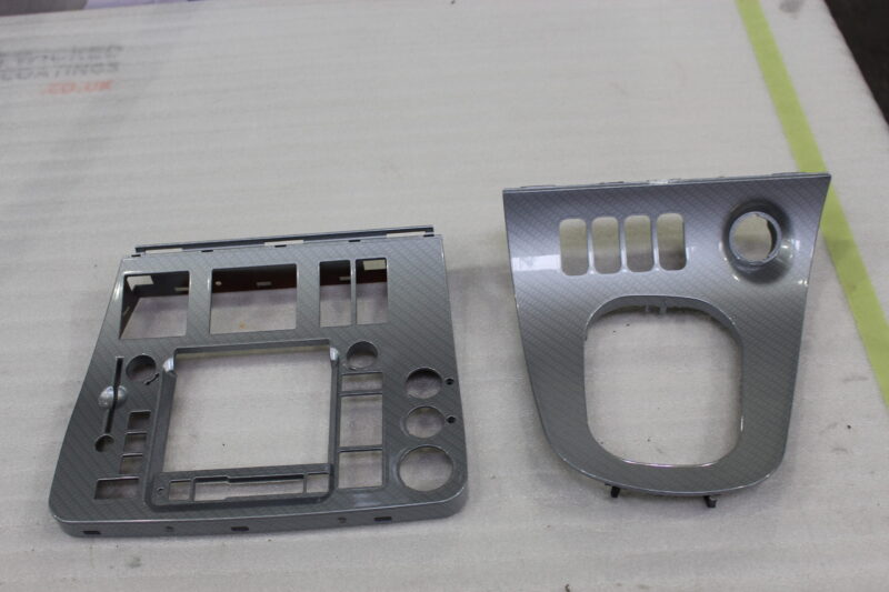 Alfa Romeo dashboard elements coated in carbon fibre painted silver