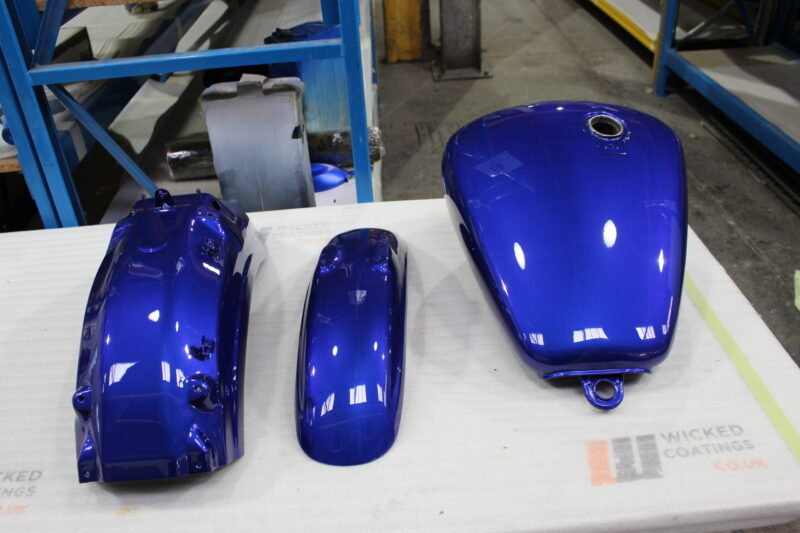 Motorbike parts painted at navy blue