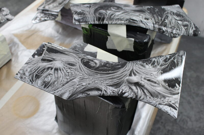 Motorbike parts coated in horror theme hydrographic film