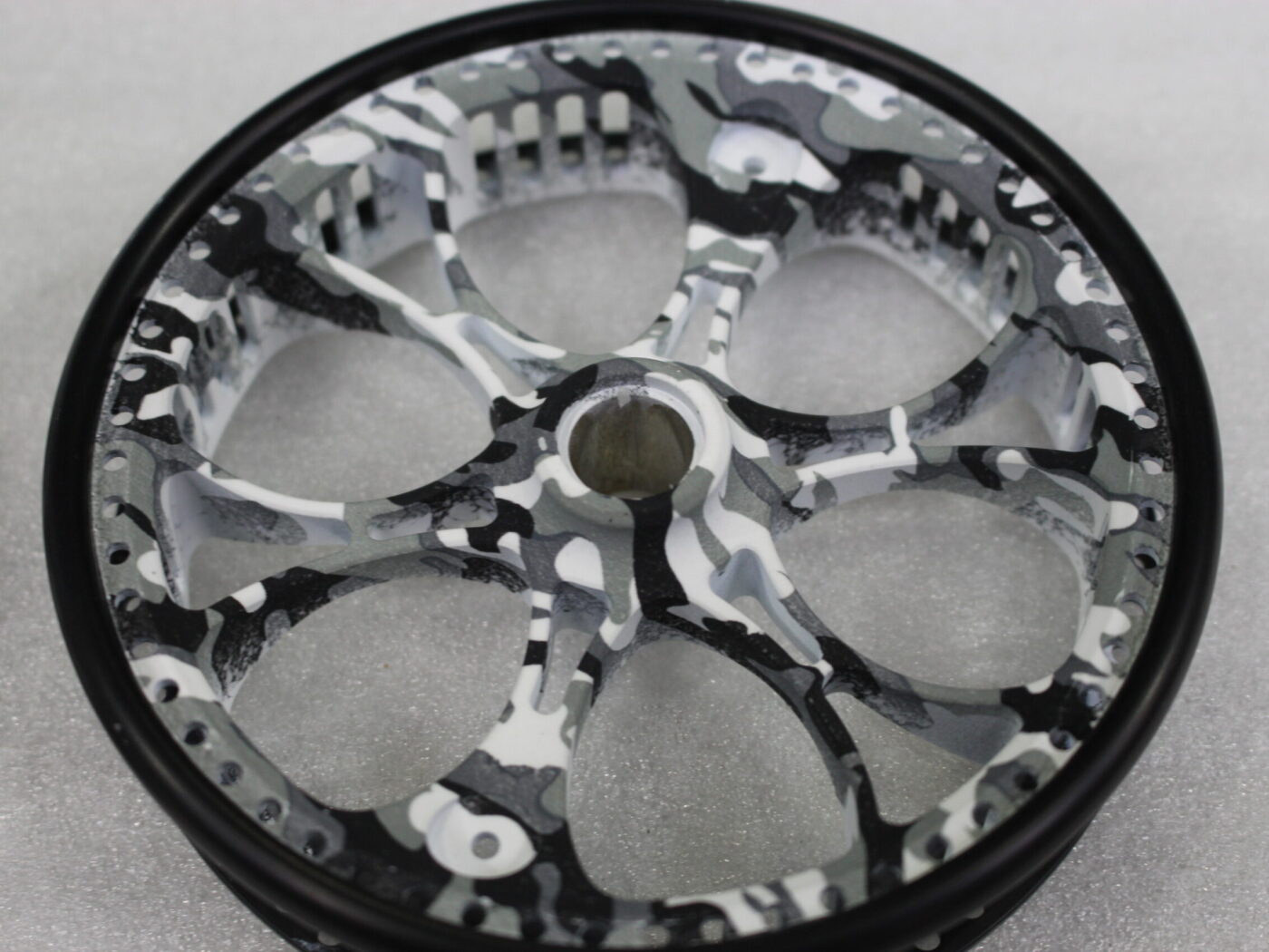 Fishing Reel Coated In Camouflage Hydrographic Film