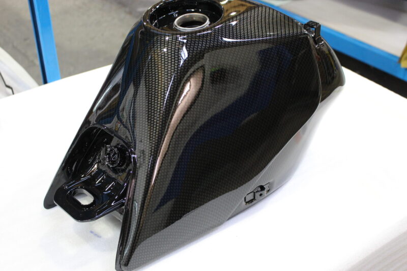 Motorbike tank coated in carbon fibre